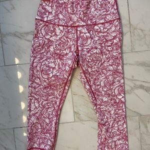 Pink floral lululemon mid rise crop leggings, size 10